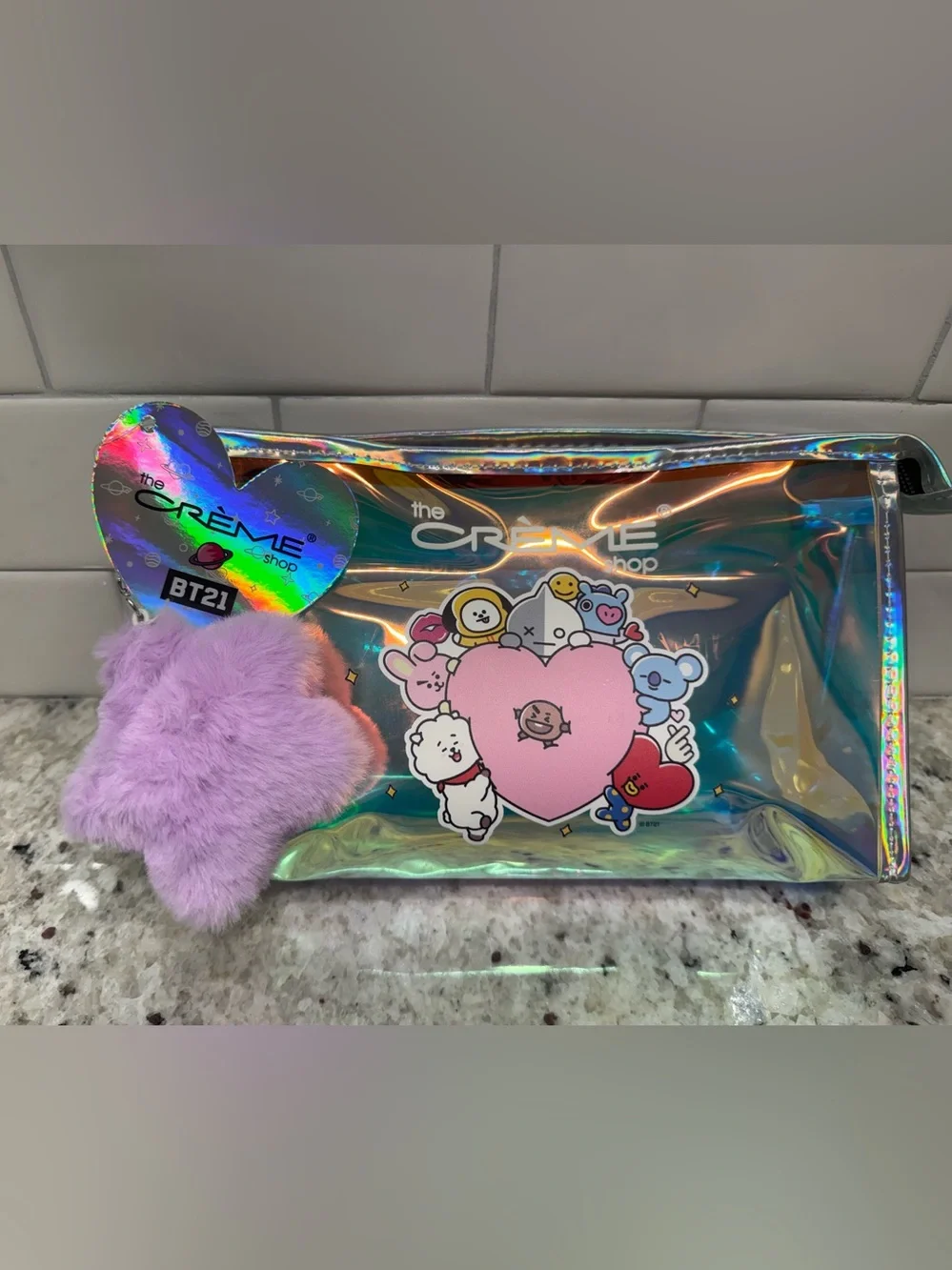 Crème Shop holographic BT21 pouch with purple fuzzy star charm NWT